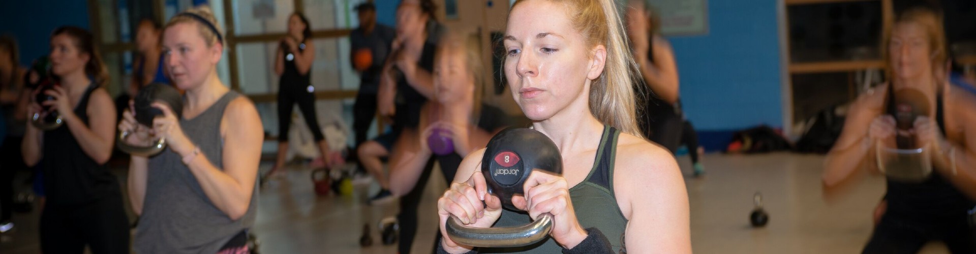 Girl with Kettlebells